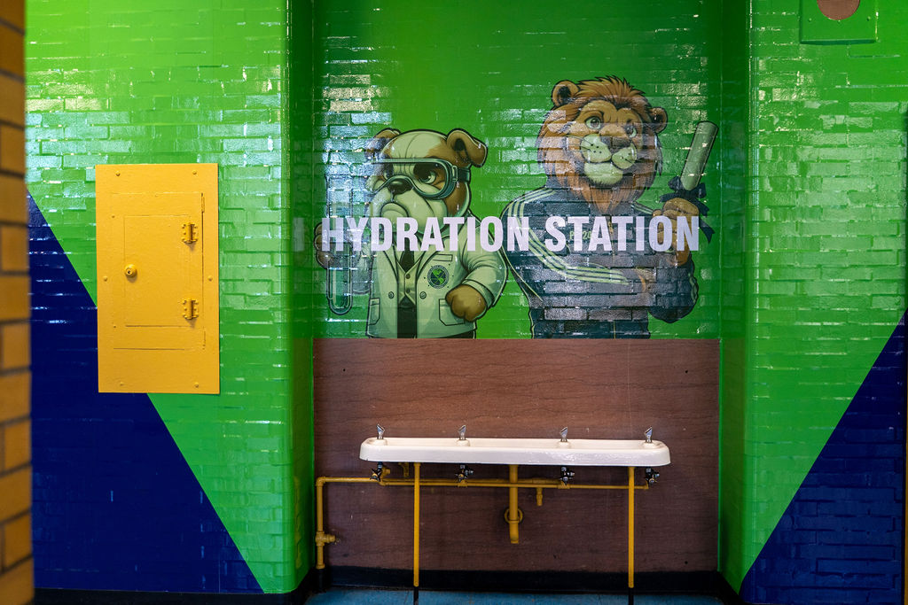 Original mascot artwork applied across the environment